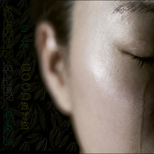 Close-up of a person's ear and side of face with album text overlay