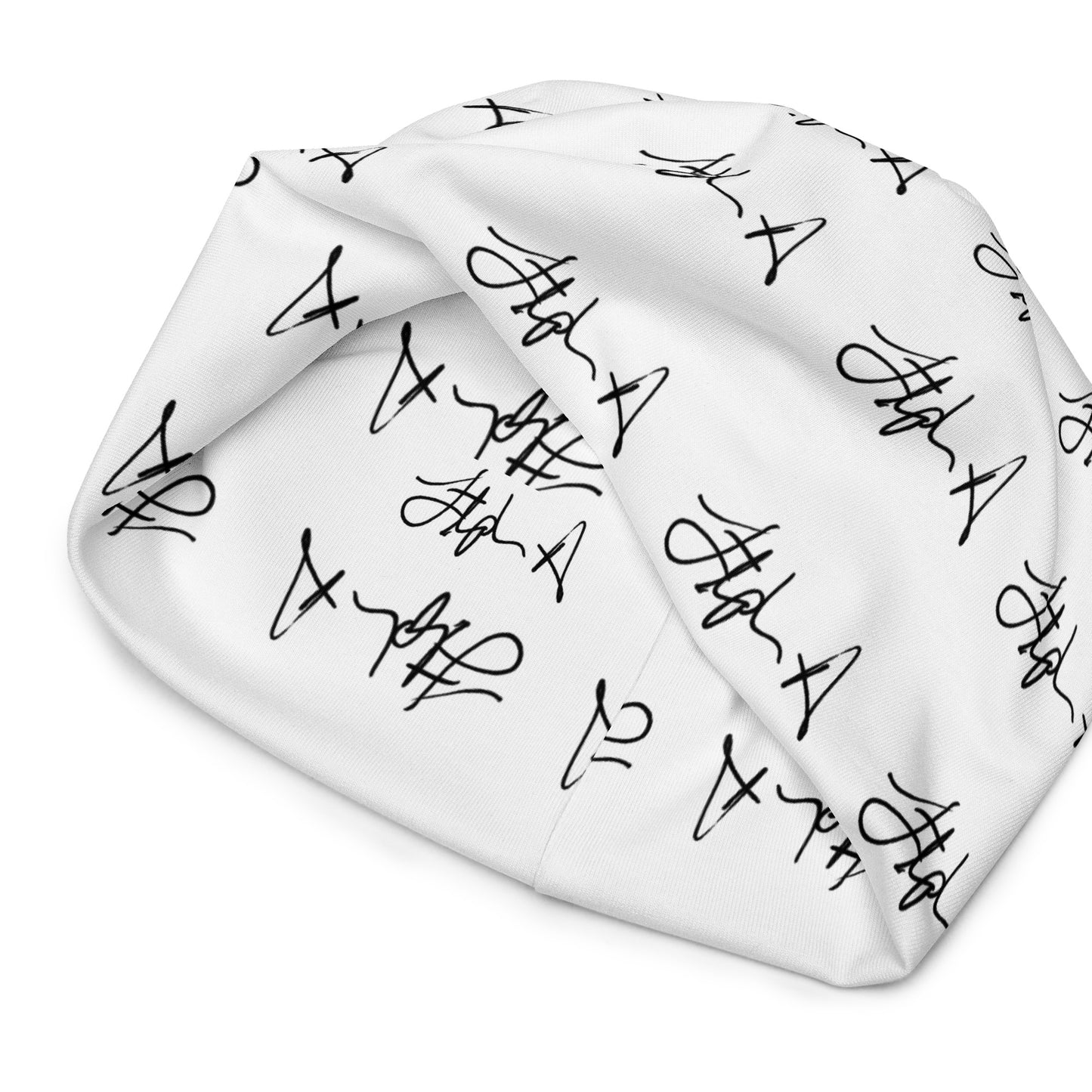 A white beanie hat featuring an all-over black script pattern, shown against a plain white background. Stephen Allen Music