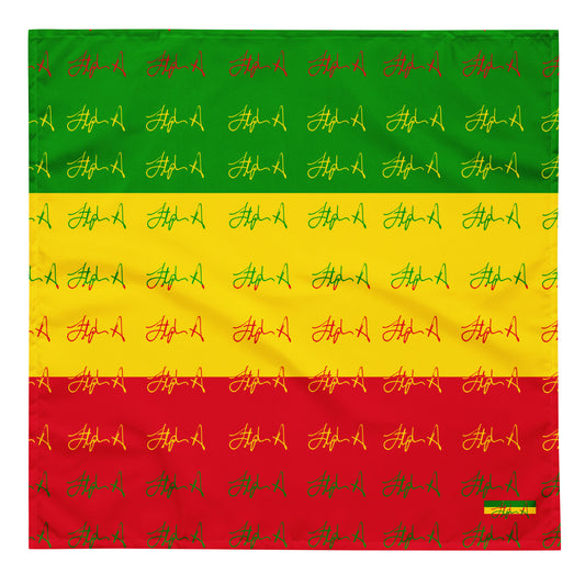A square bandana featuring a Rastafarian flag-inspired pattern of horizontal green, yellow, and red stripes, overlaid with a repeating pattern of small yellow and green script signatures. Stephen Allen Music