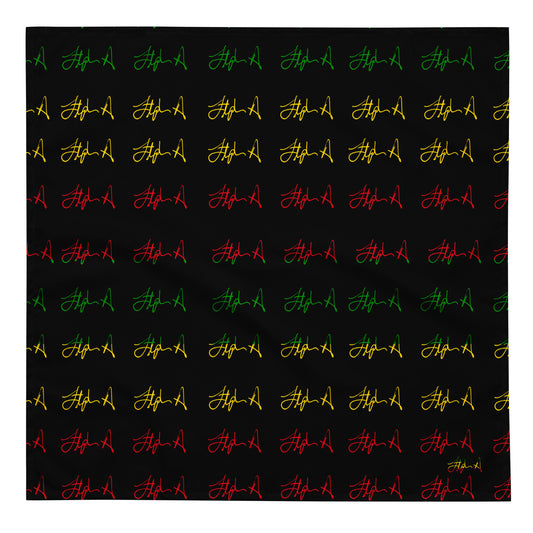 A square black fabric or paper product featuring a repeating pattern of stylized 'A' letters in green, yellow, and red script, with a small signature-like mark in the lower right corner. Stephen Allen Music