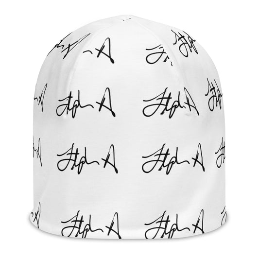A white beanie hat featuring an all-over black script pattern, shown against a plain white background. Stephen Allen Music