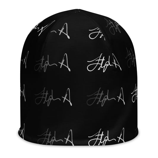 A black beanie hat featuring an all-over repeating white script logo pattern, shown against a plain white background. Stephen Allen Music