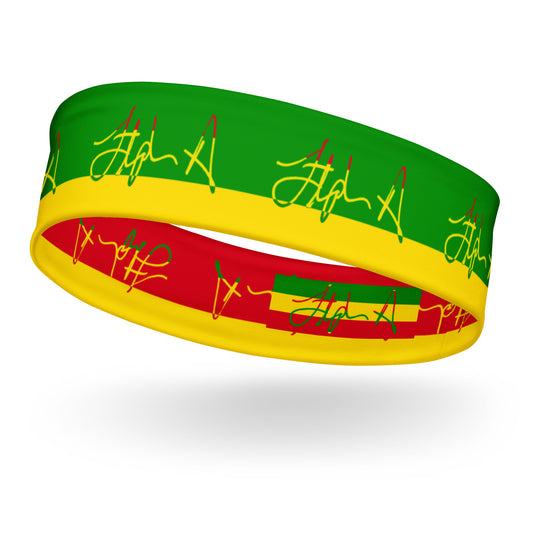 A silicone headband featuring the green, yellow, and red horizontal stripes of the Rastafarian flag, decorated with green and yellow script signatures on a white background. Stephen Allen Music