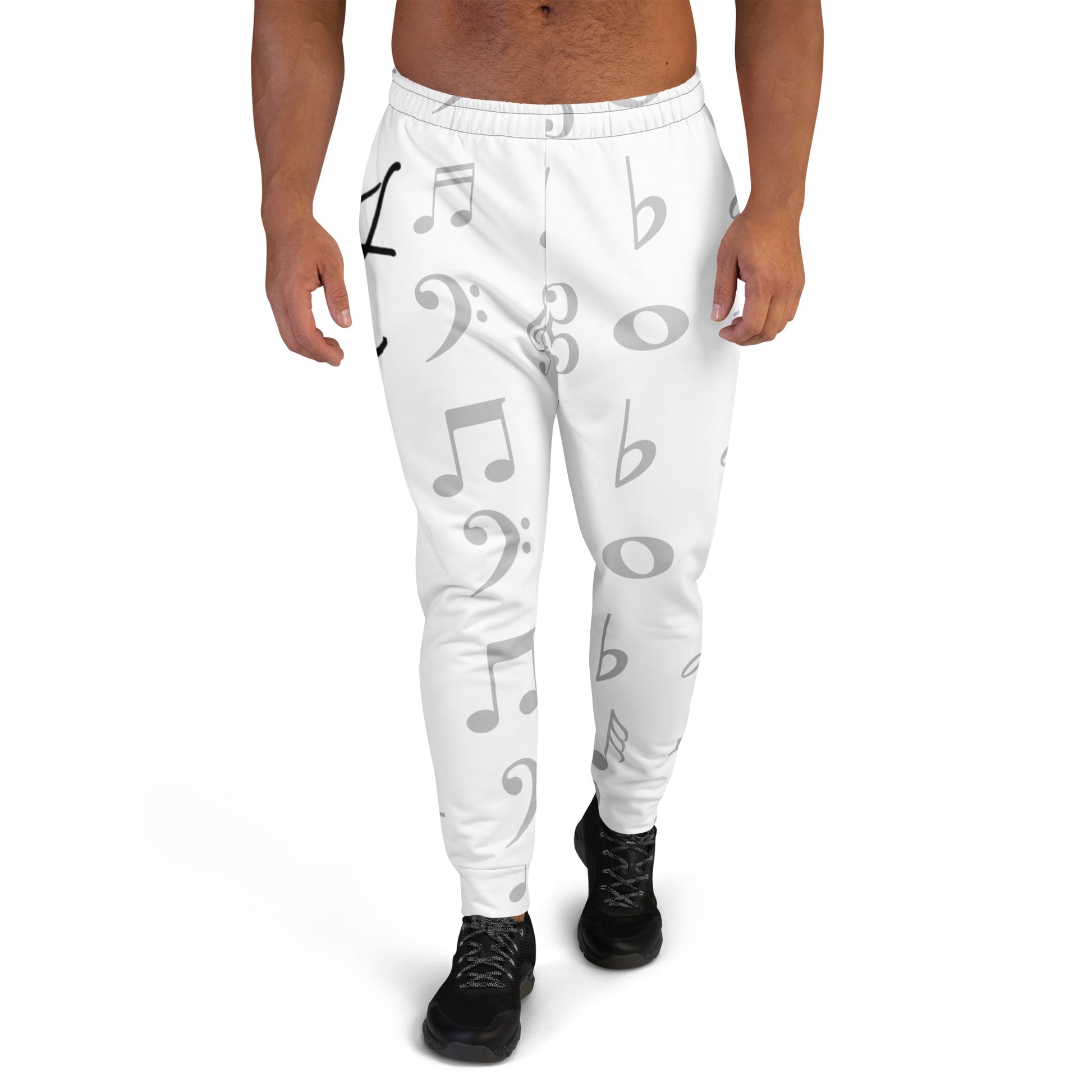 White jogger pants with musical note pattern worn by a person on a white background Stephen Allen Music