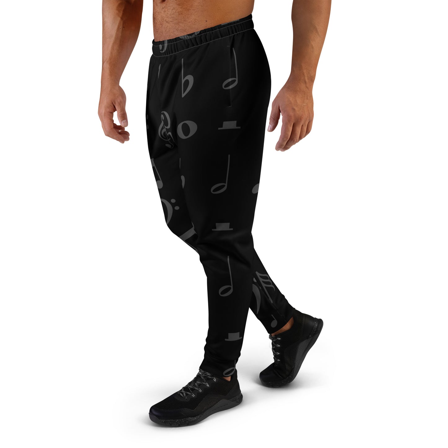 Black jogger pants with musical note pattern worn by a person on a white background Stephen Allen Music