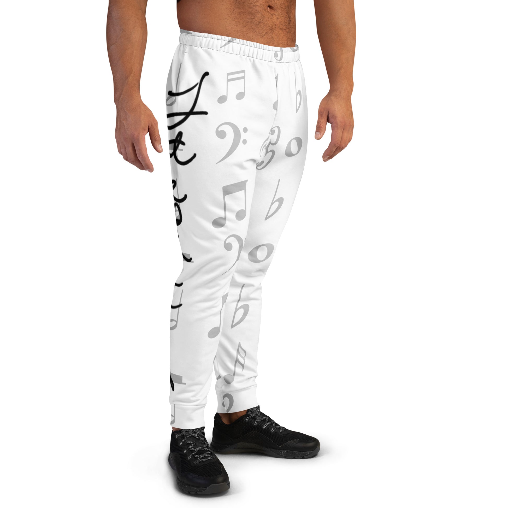 White jogger pants with musical notes design worn by a person on a white background Stephen Allen Music