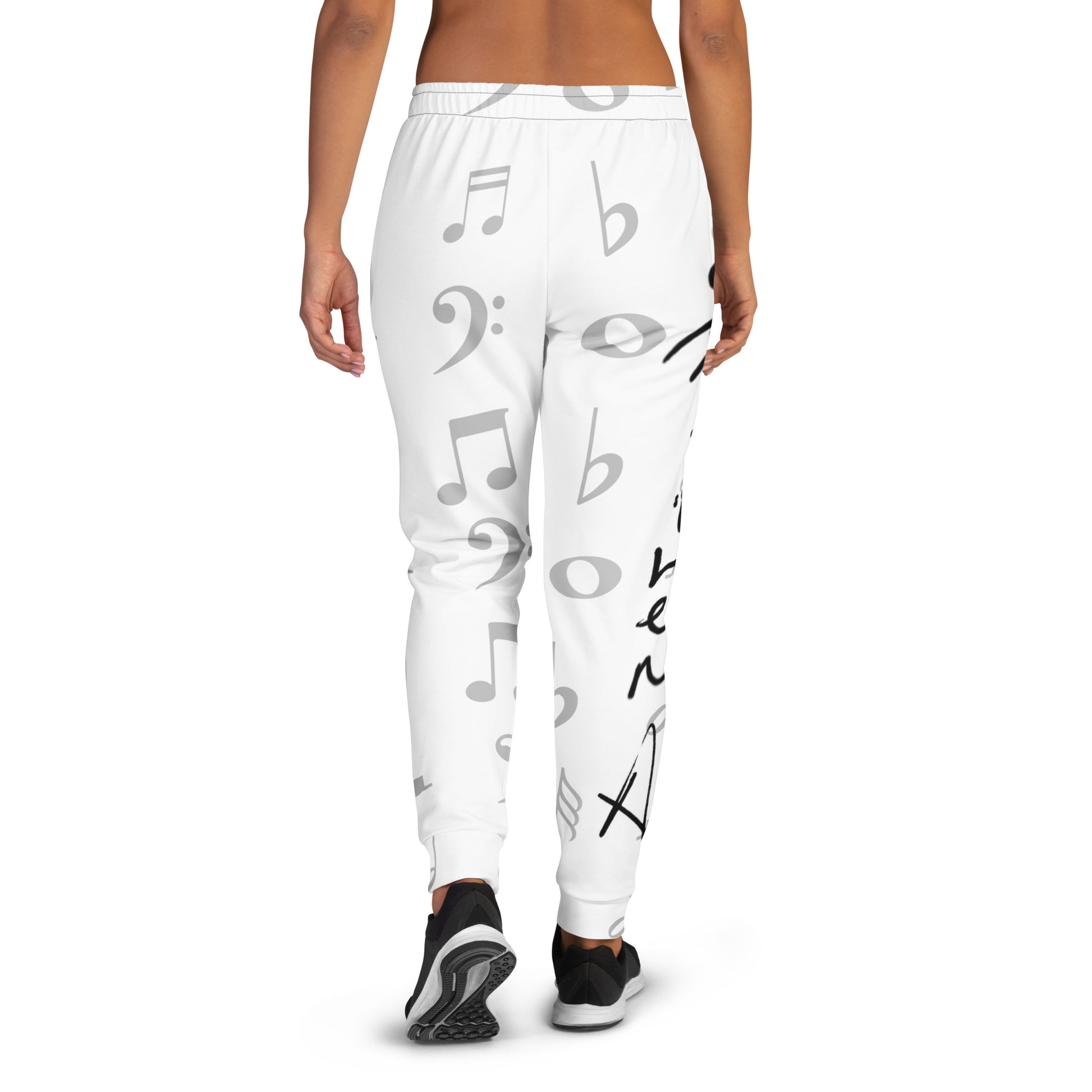 White jogger pants with black symbols worn by a person on a white background Stephen Allen Music