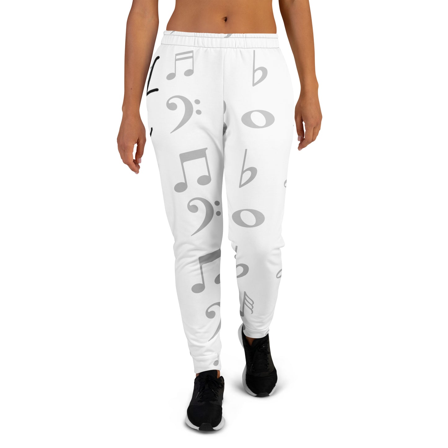 White sweatpants with musical note and bass clef pattern worn by a person on a white background Stephen Allen Music