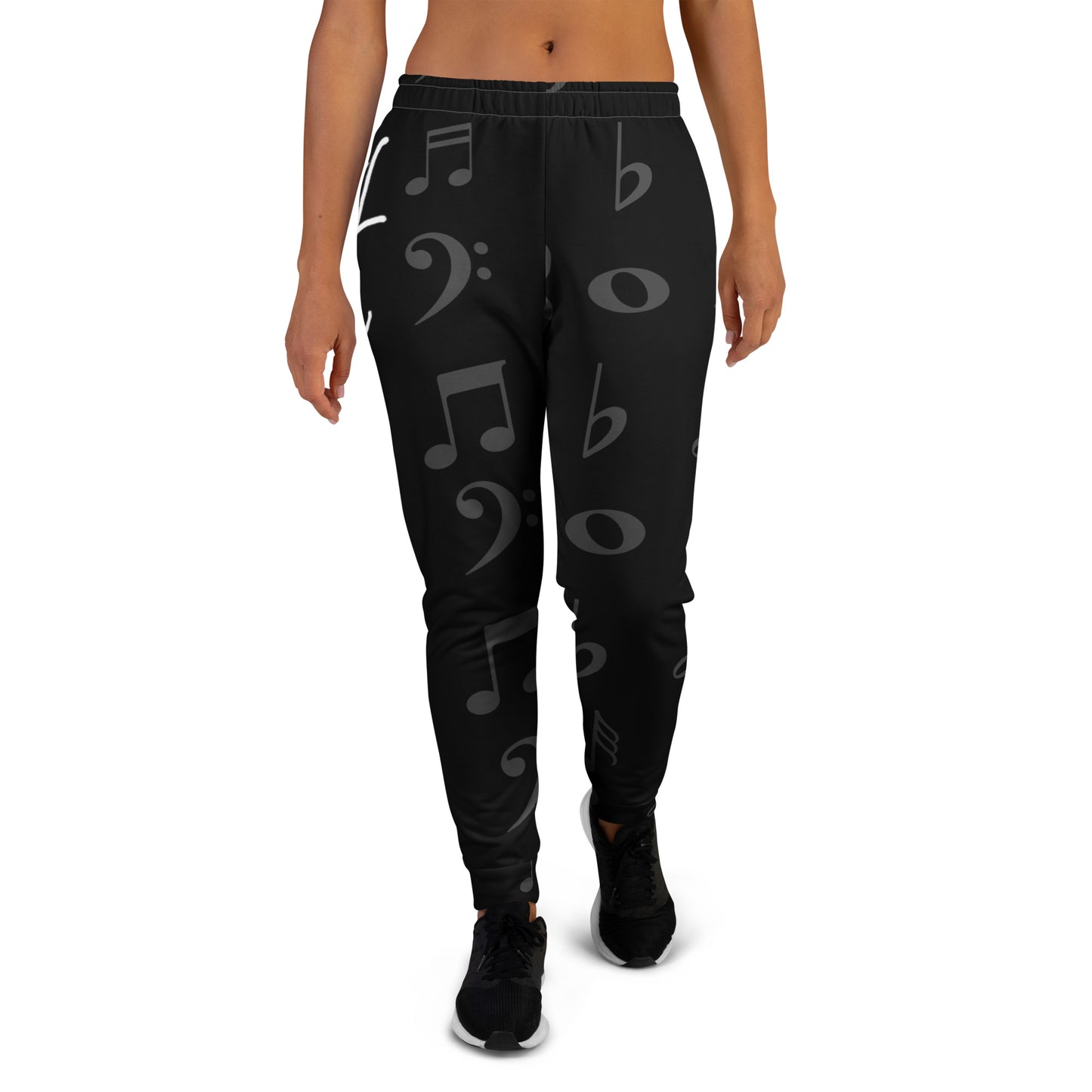 Black jogger pants with musical符号 design worn by a person on a white background Stephen Allen Music