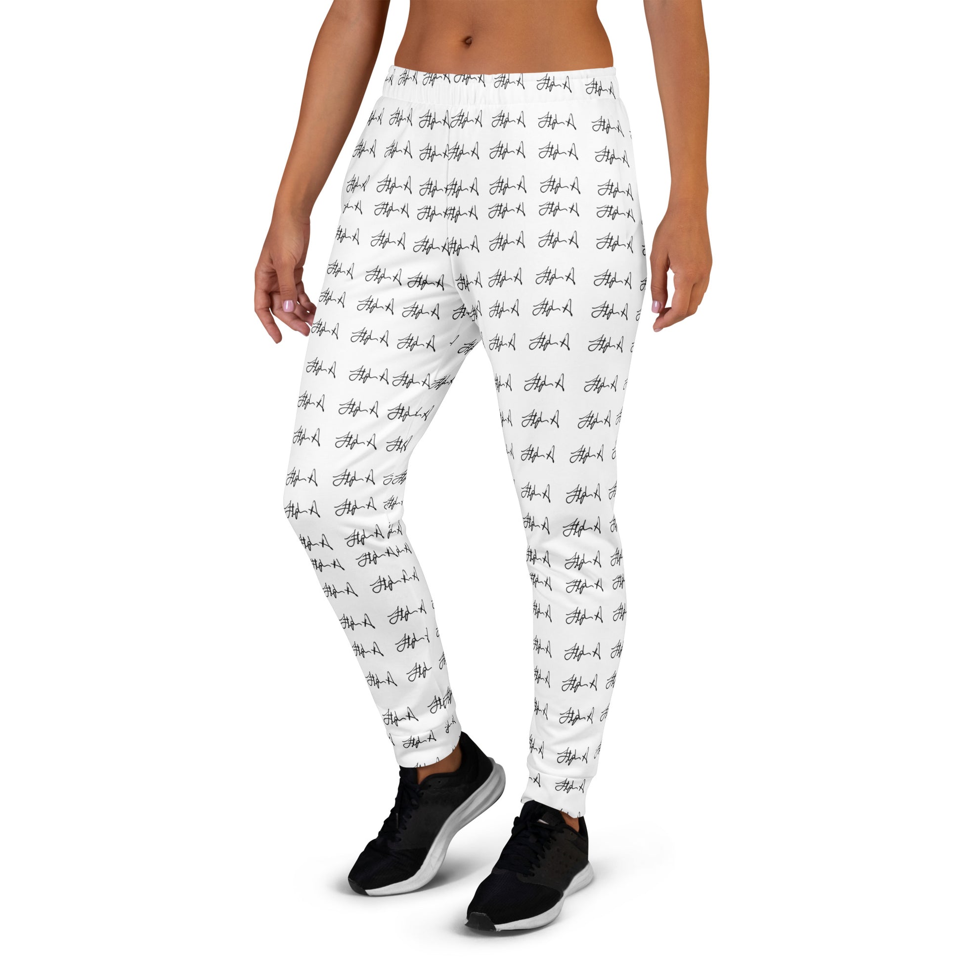 White leggings with an all-over black script pattern, shown on a model from the back against a plain white background. Stephen Allen Music