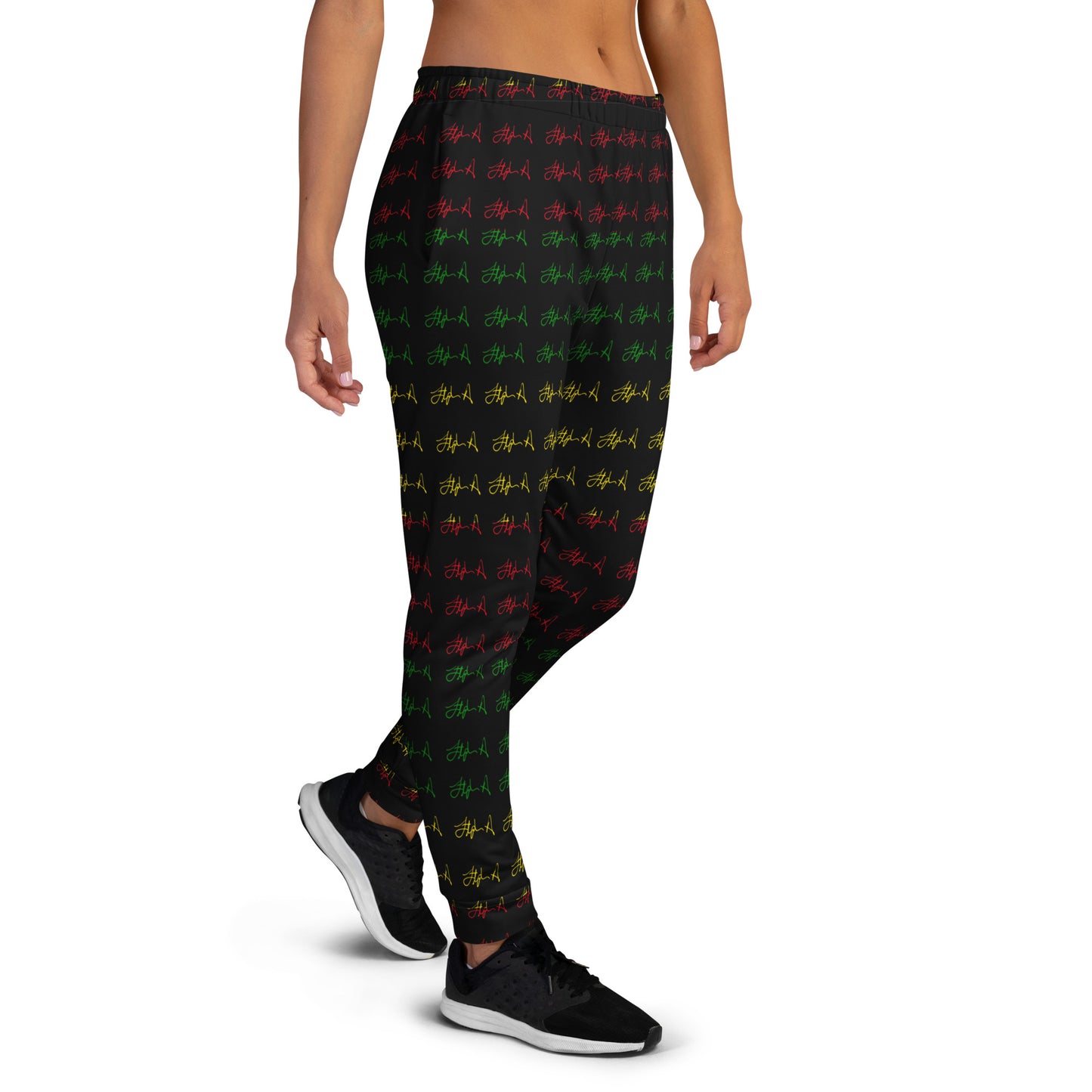 A person modeling black leggings with an all-over repeating pattern of small red, green, and yellow graffiti-style tags, shown against a plain white studio background. Stephen Allen Music