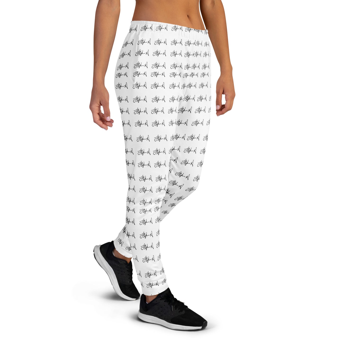 White leggings with a black repeating script pattern, modeled from the waist down on a white background. Stephen Allen Music